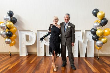 Two guest attending the senior citizens prom 