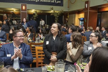 Students enjoying a night conversing with McGeorge alumni.