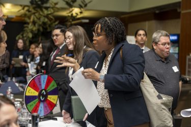 Student speaking with an employer.