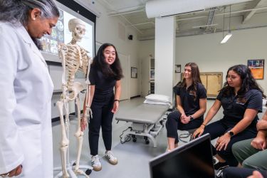 PT students giving lecture