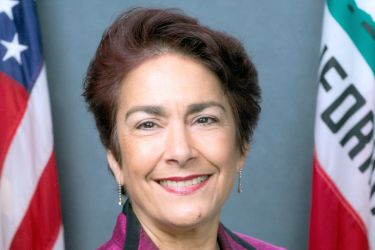 A portrait of a senator indoors