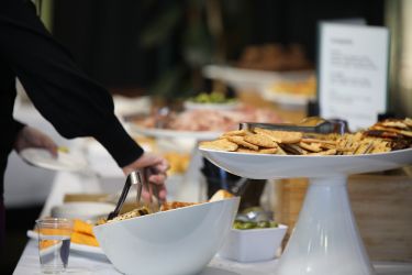 A table of food for people to share. 