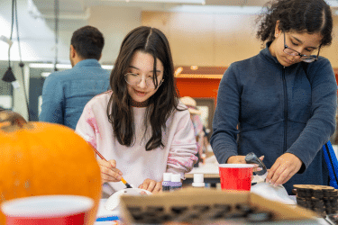 students using art to make a project