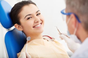 smiling patient in chair