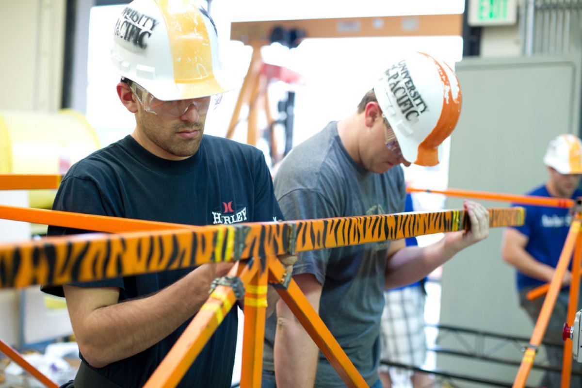 Students building a bridge. 