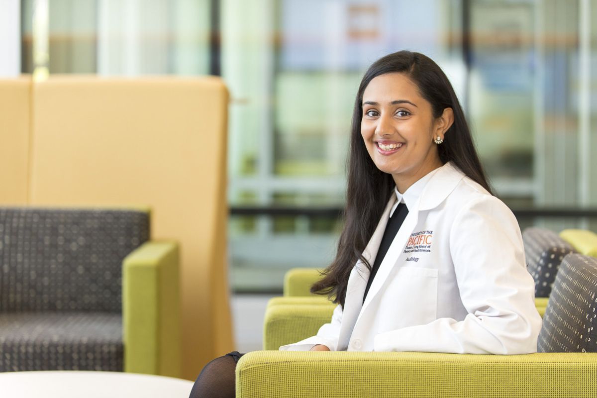 Audiology student sitting in lobby