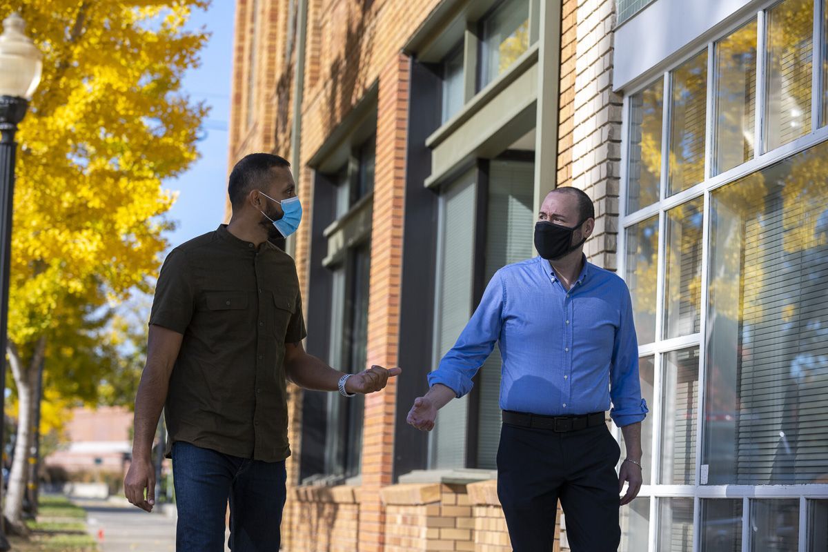 students walking in front of Muddox building
