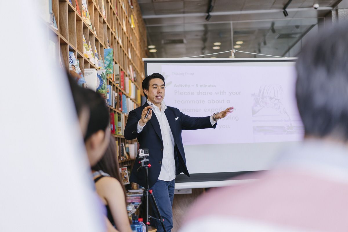 Businessman speaking to group