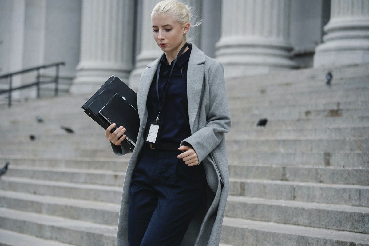 woman walking down court steps