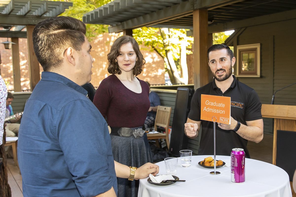 Students meet with Graduate Admission at an on-campus Open House.