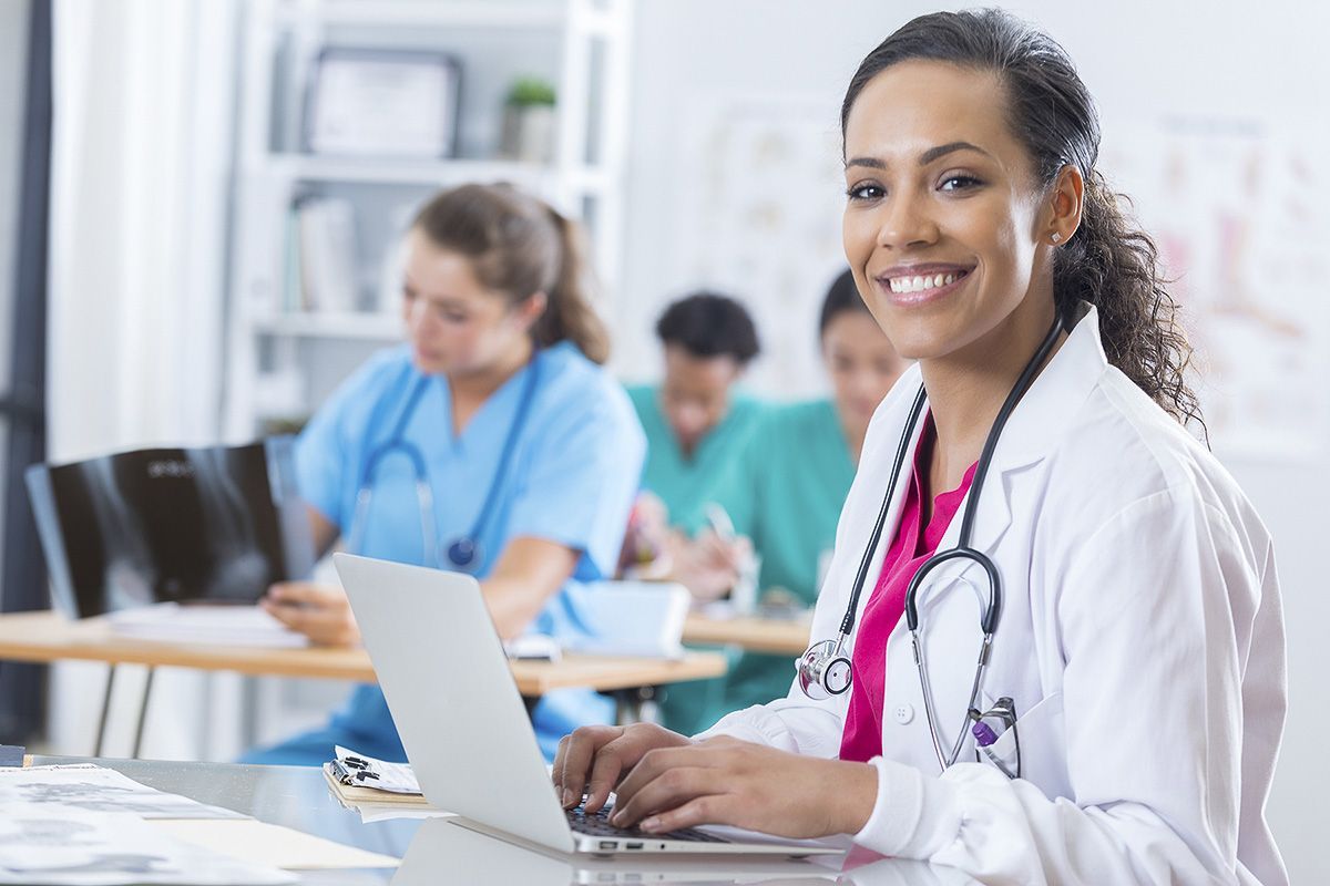 health care student on laptop