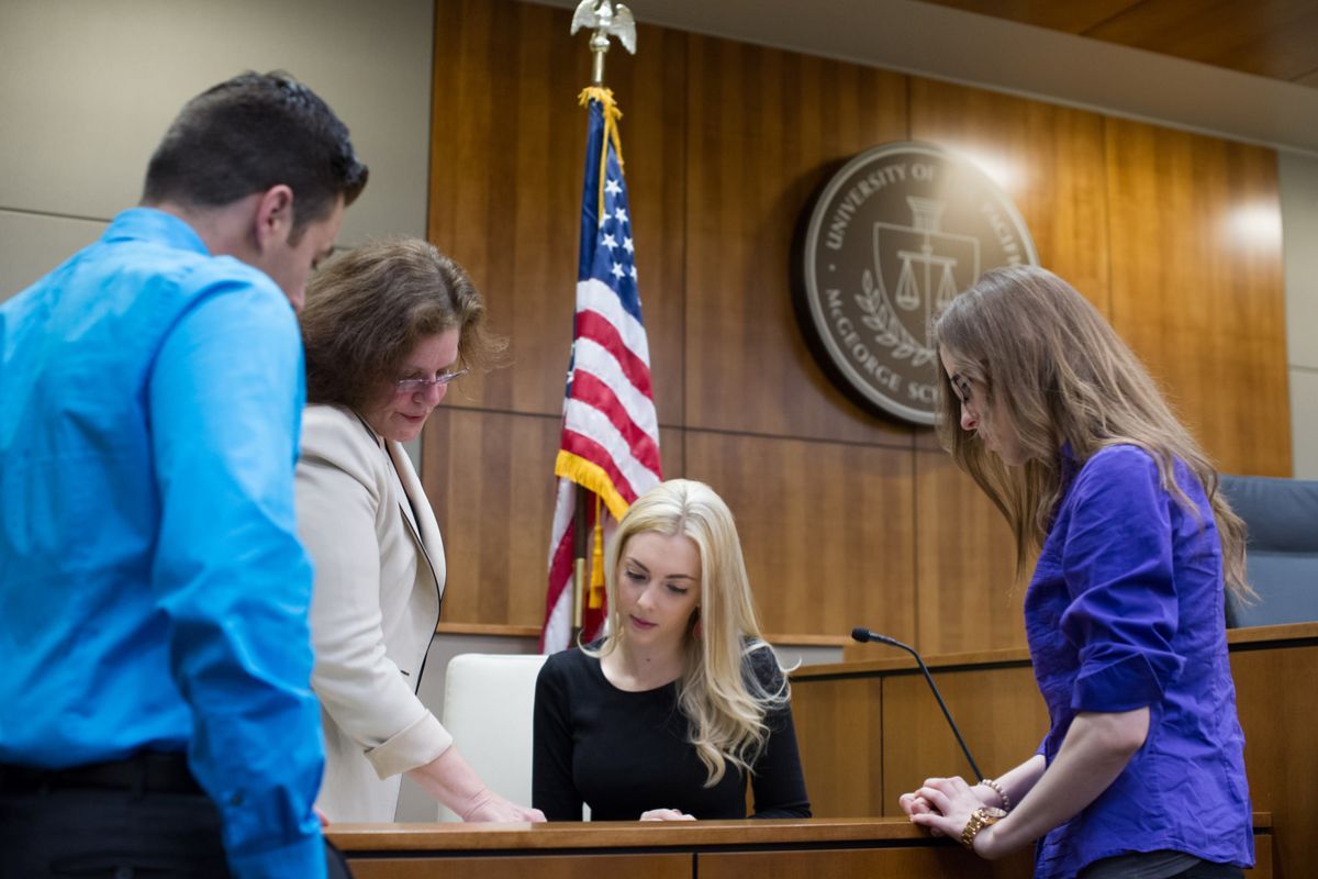 law student and faculty at the courthouse