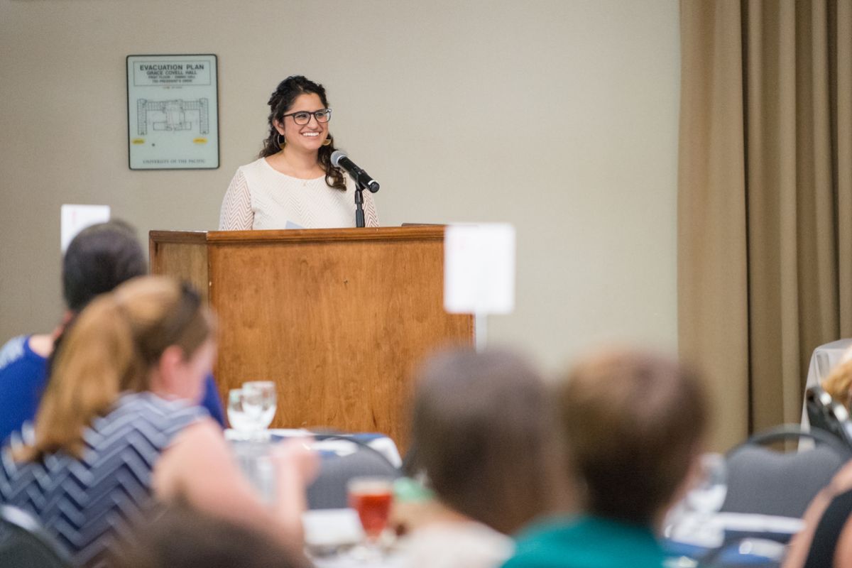 Pacific alumna Marukh Hasan speaking at an event