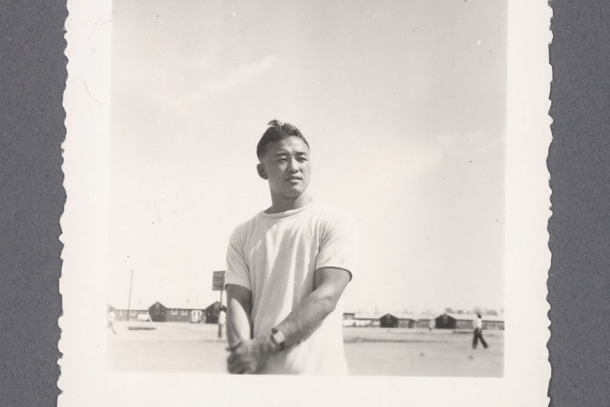 a japanese-american man standing