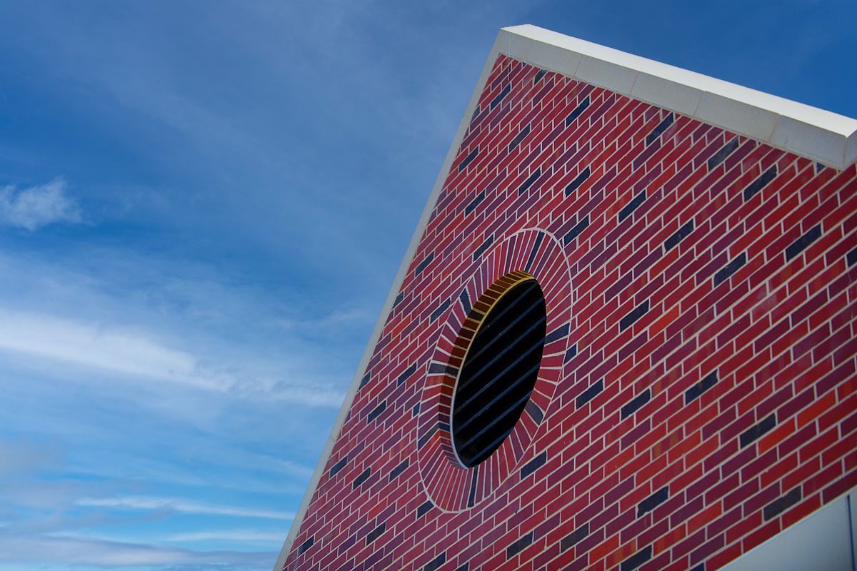 a detail from the alumni house exterior