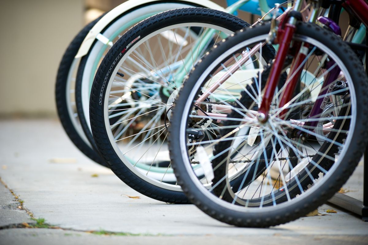 the front tires of a row of bicycles