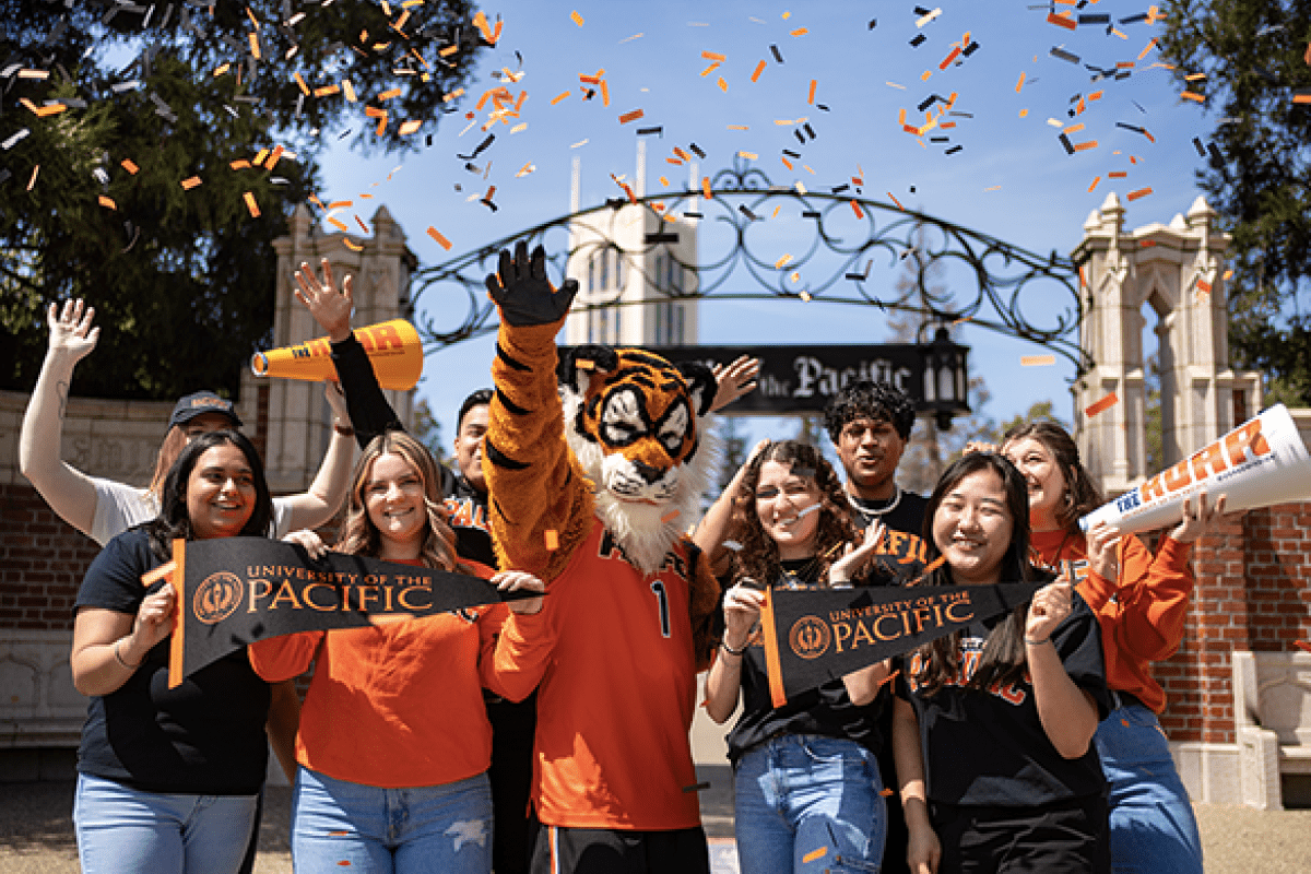 Powercat and students with confetti at the Pacific gate