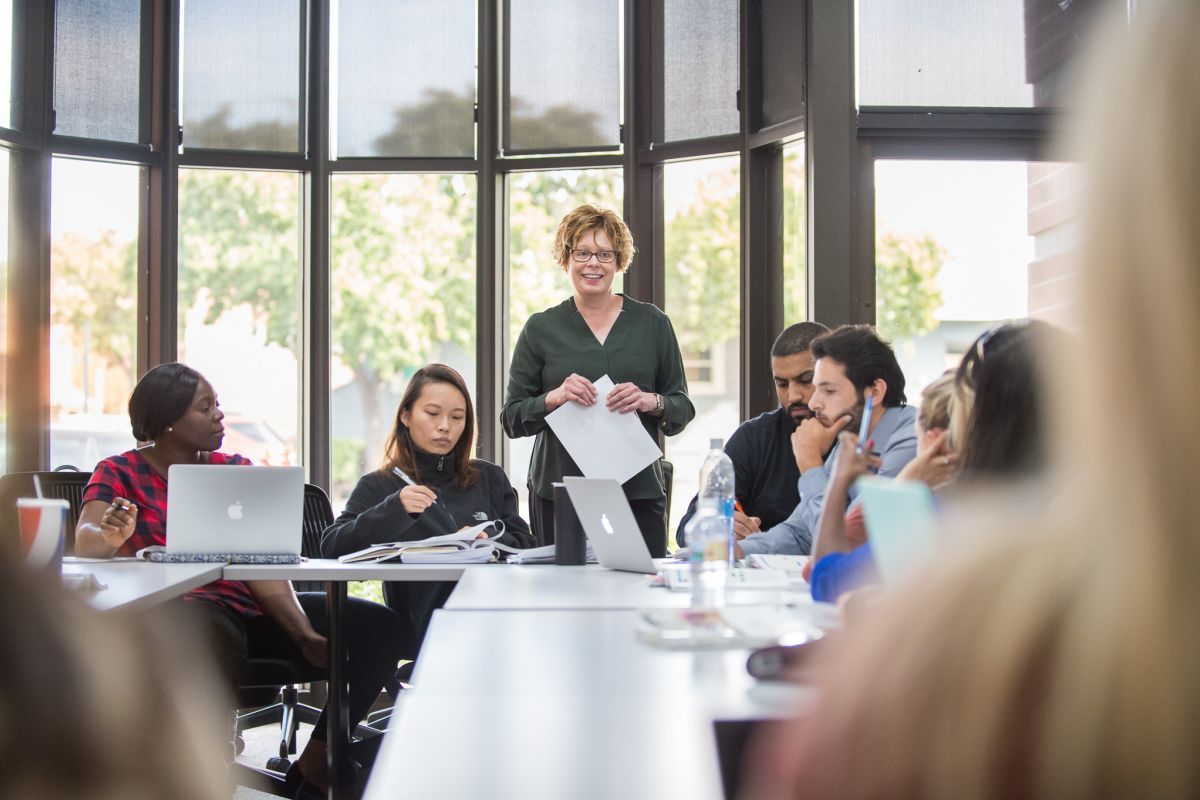 classroom with professor at the center