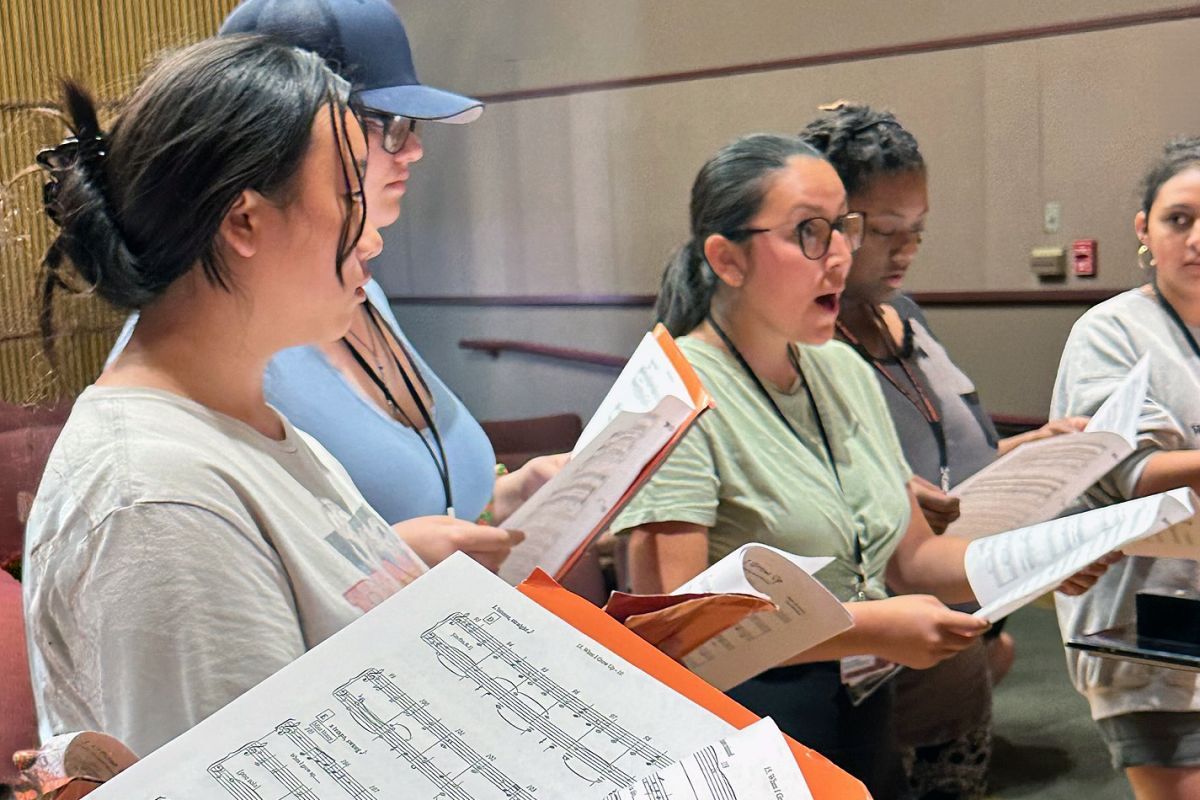 Participants of the Pacific Voice Day rehearse at the Conservatory