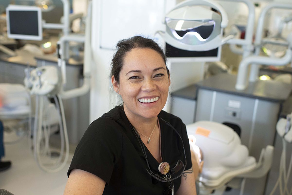 RDAEF student smiling in clinic