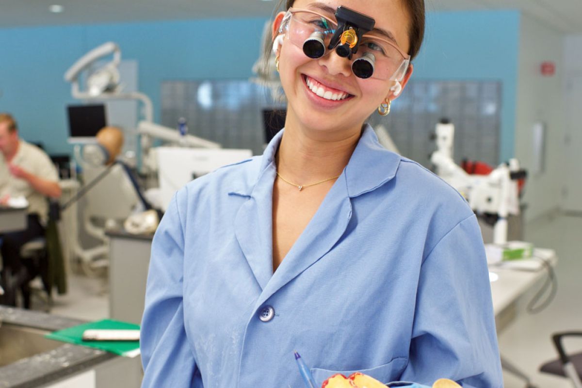 Student with magnifiers
