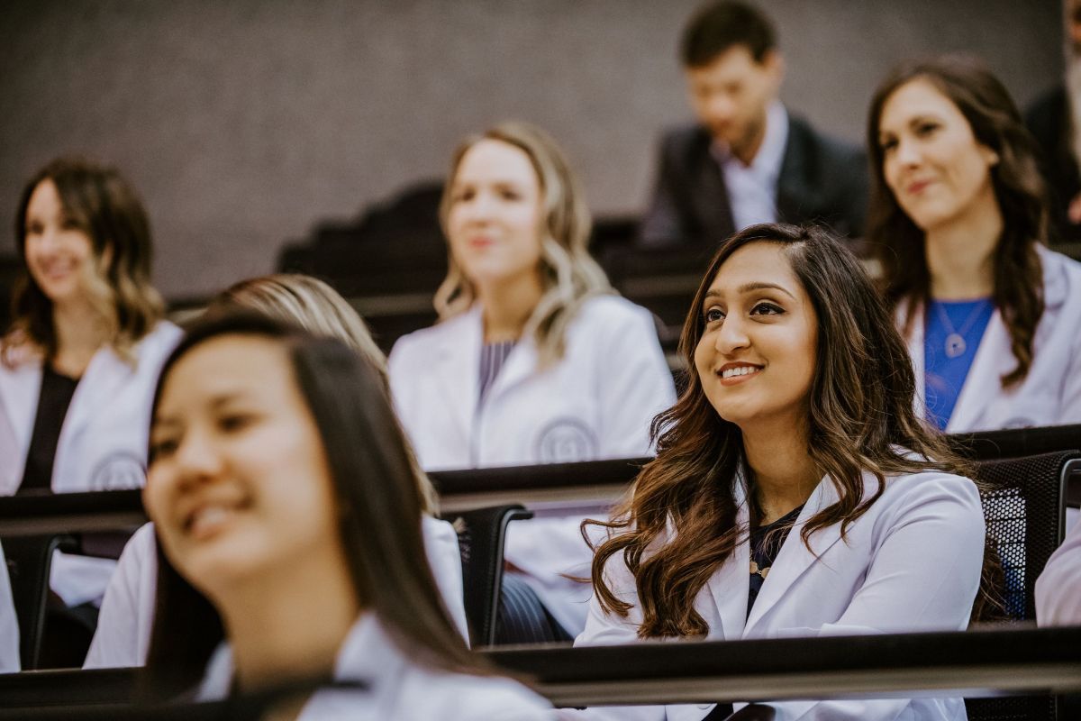 Photo shows Pacific PA students listening to a lecture in a classroom.