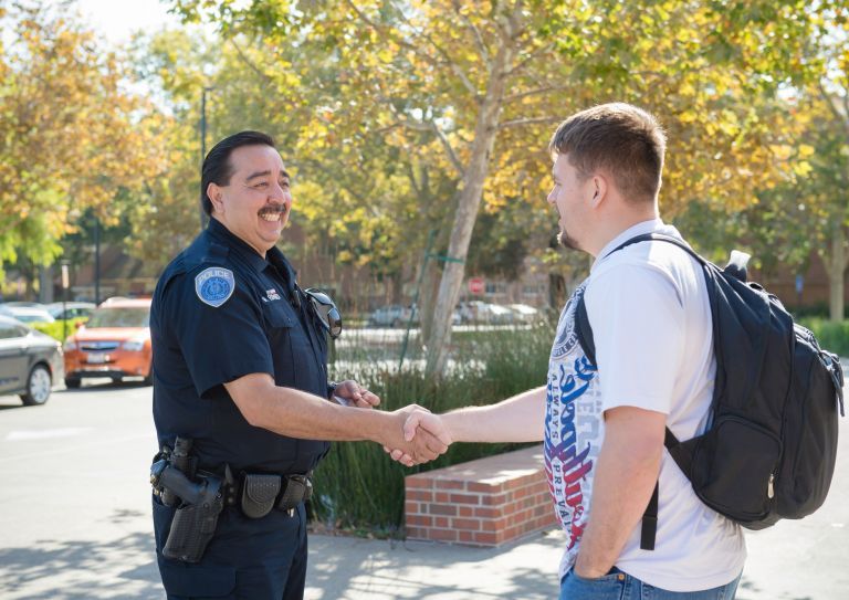 officer with students