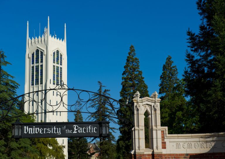 University of the Pacific sign with Burns Tower in the background