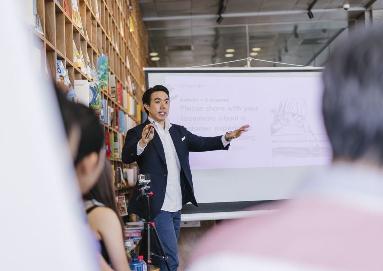 Businessman speaking to group