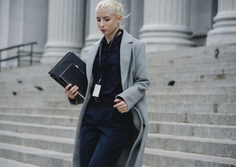 woman walking down court steps