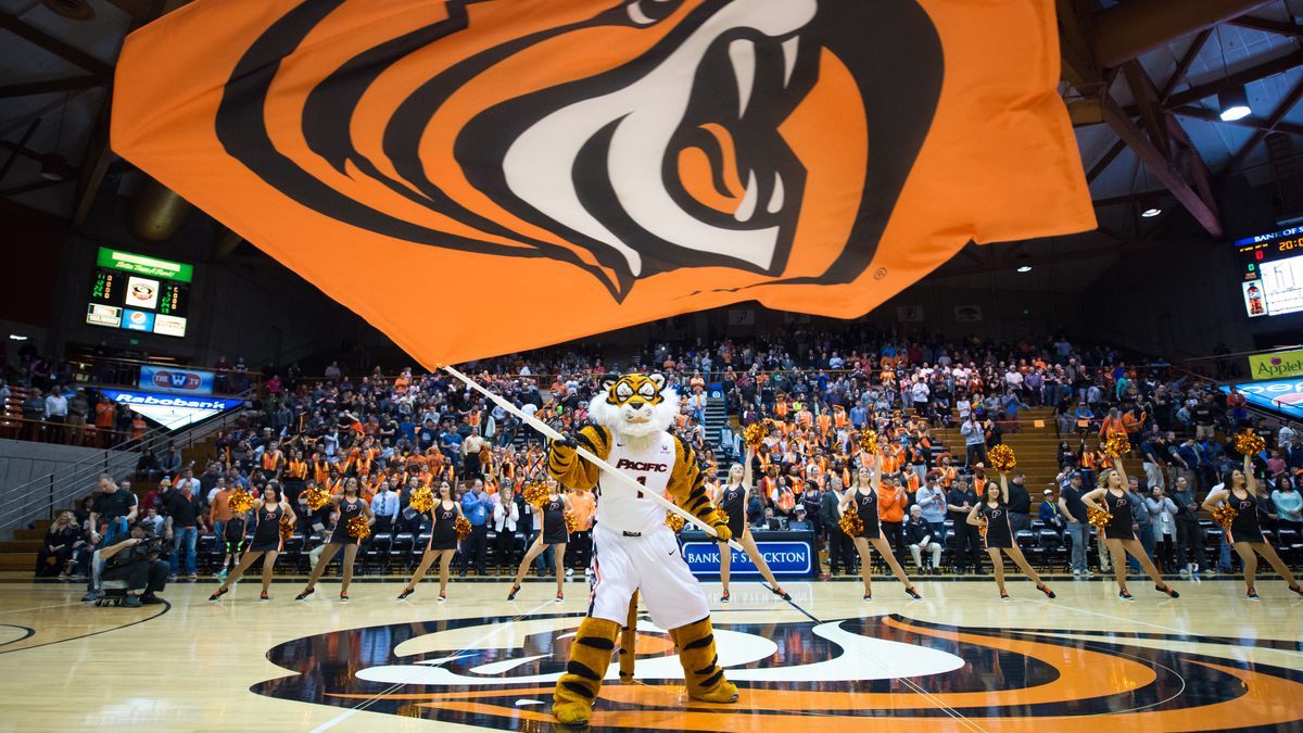 Powercat waves a flag of the Pacific mascot.