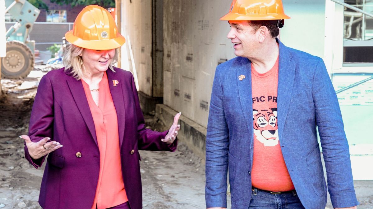 Maria Blandizzi and Josh O'Connor interacting 