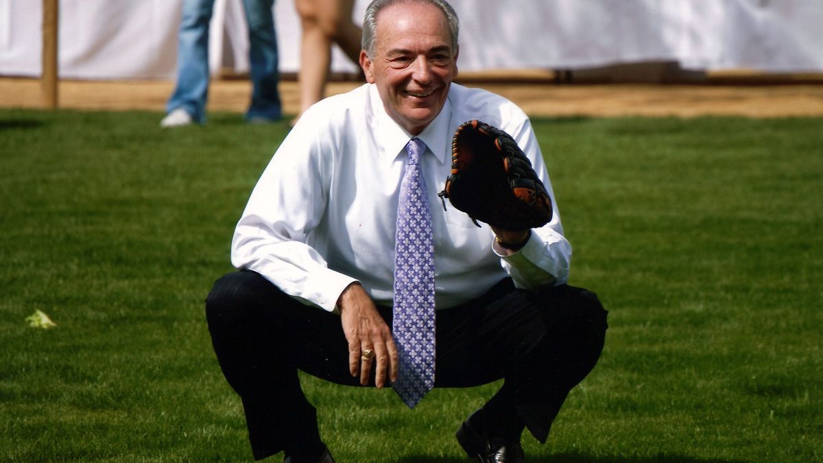 Don DeRosa holds baseball mitt