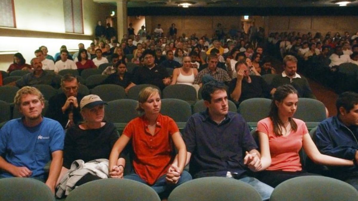 Students hold hands at 9/11 vigil