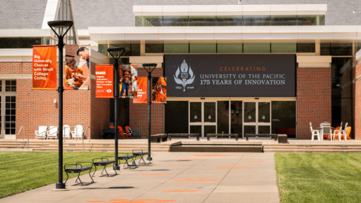Light posts with flags in each side and the new DUC screens
