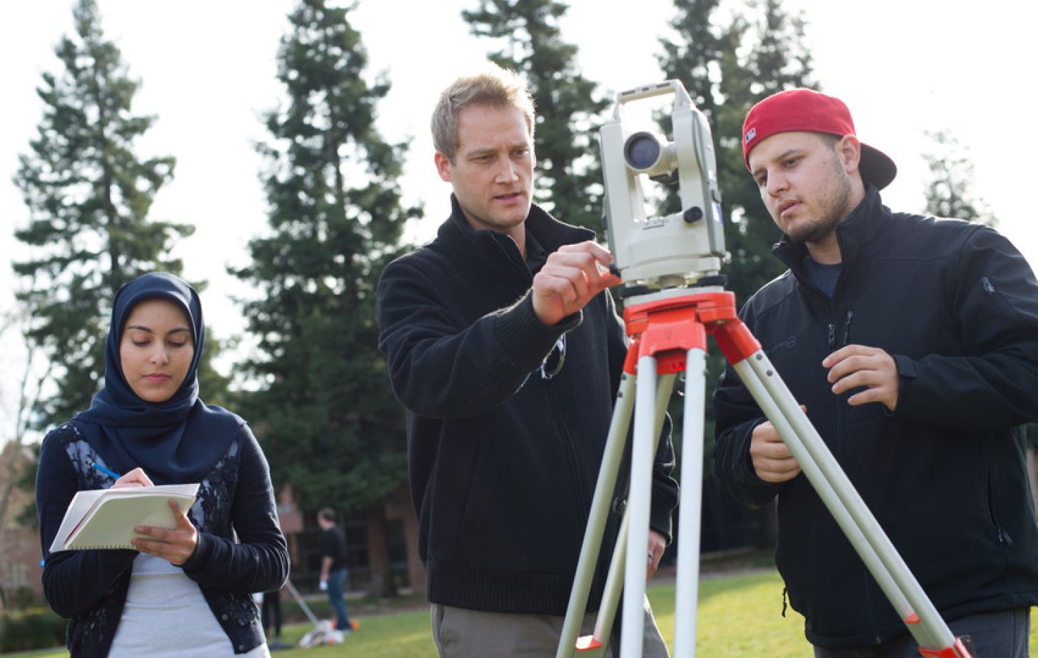 Engineering students in the field.