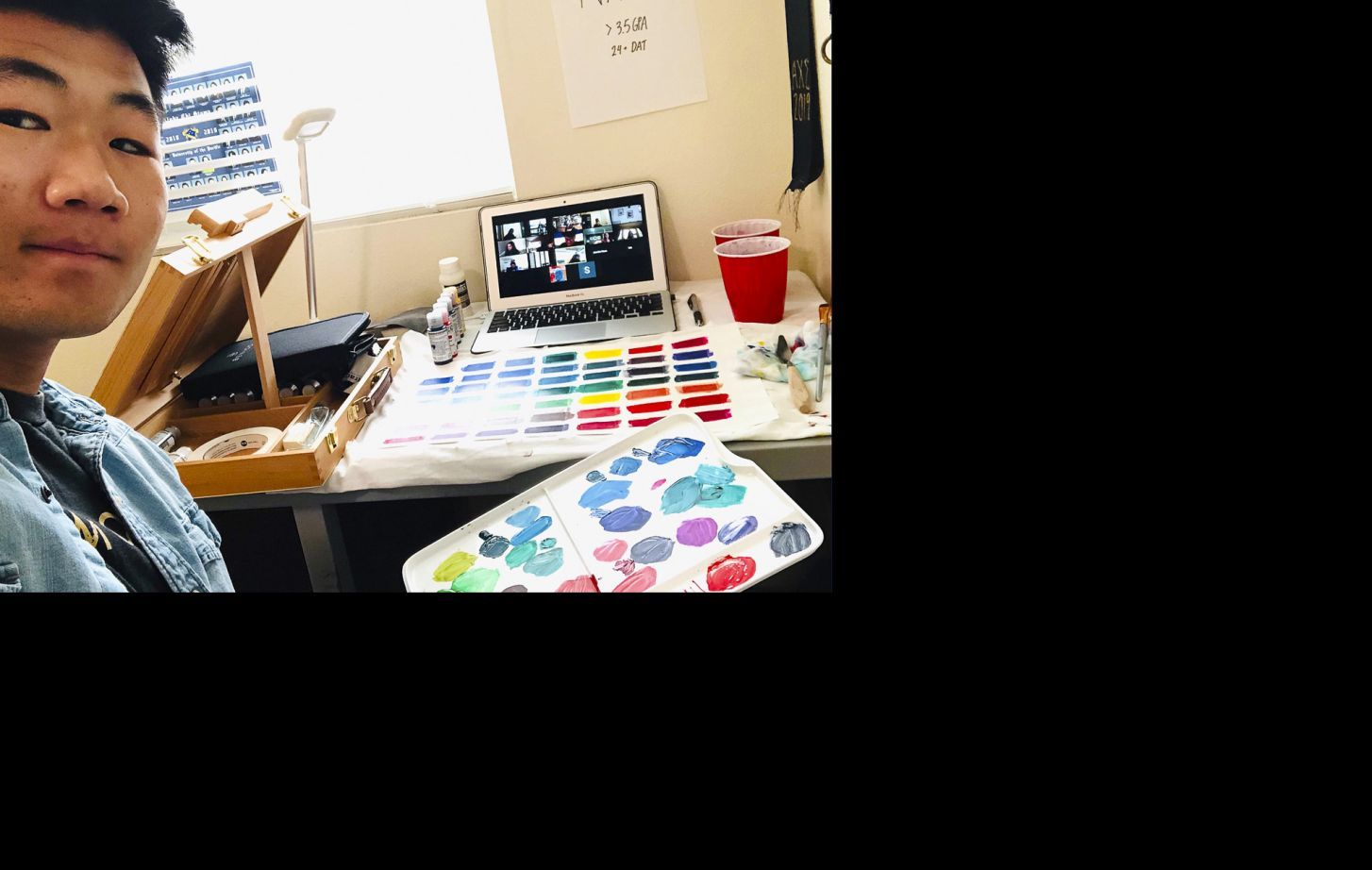 Art student with supplies