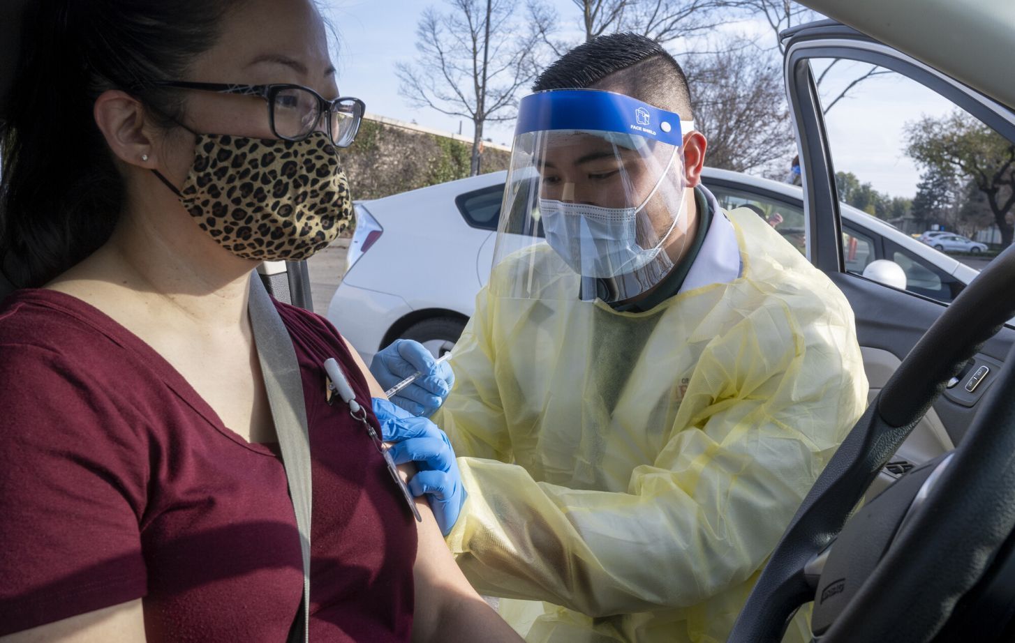 person receiving COVID-19 vaccine