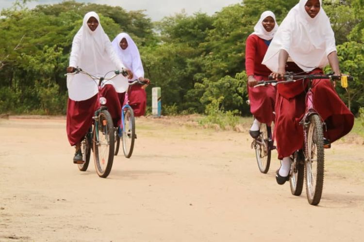 Tanzania girls riding bike