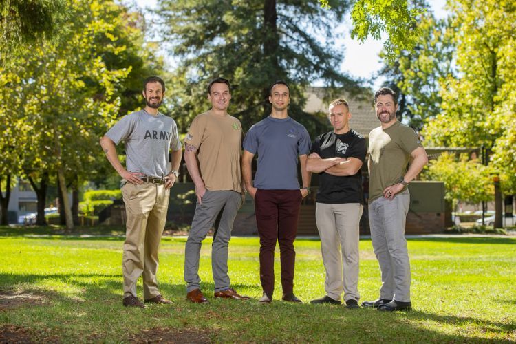 From left, former military veterans and McGeorge School of Law alumni Alex Haggard, ’21 (Army); Josh Hudnall, ‘20 (Navy); Michael LaRocque, ‘20 (Army); Matt Buelow, ’21 (Marines); and Thomas Humann, ‘20 (Marines) pose for a Military Law Society photo in October 2019.