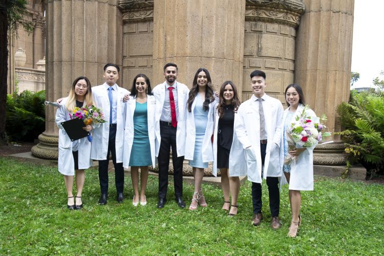 Students pose outside after the White Coast ceremony