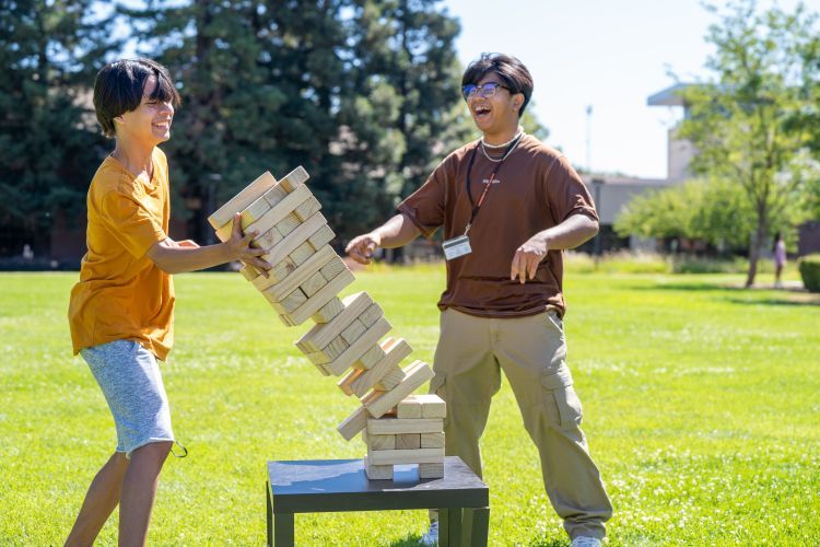 students playing Jenga