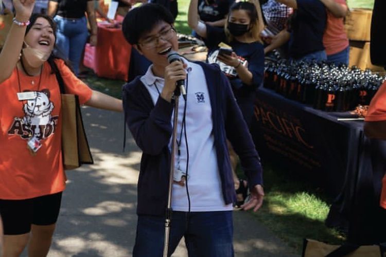 student singing karaoke