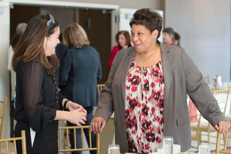 Two women talking to each other