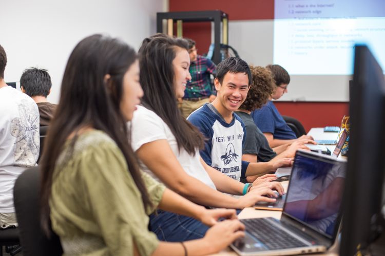 students look at computers