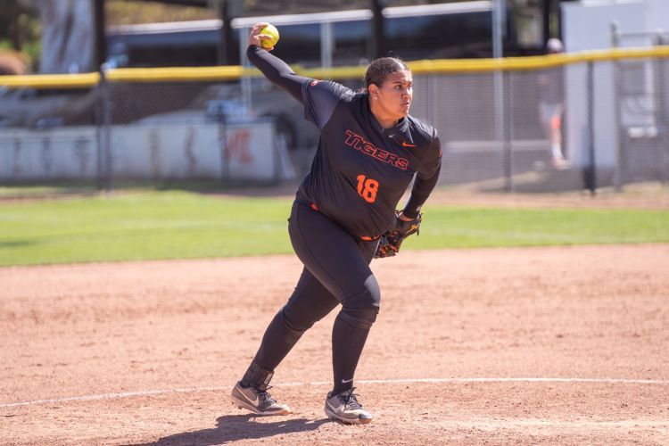 Amiyah Aponte prepares to throw out a pitch