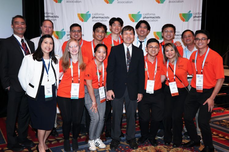 Alumnus Christopher Woo with Pacific PharmD students