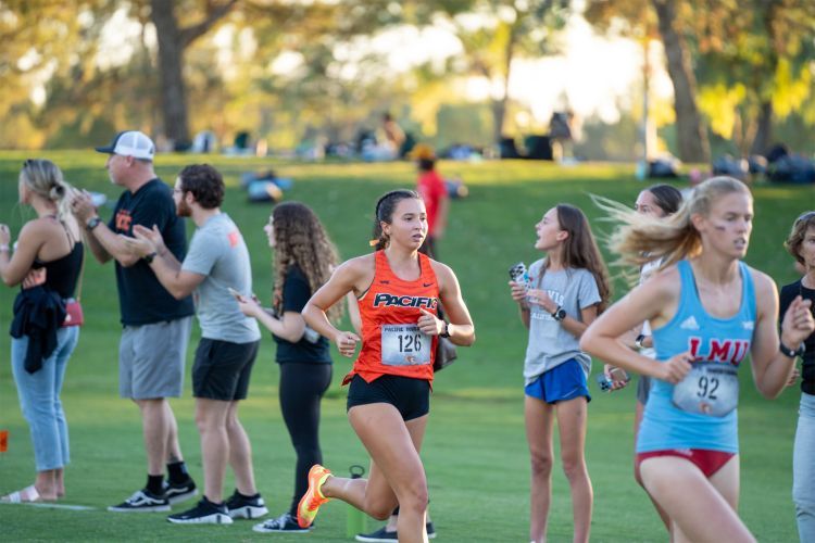 a cross country student-athlete competes in a race