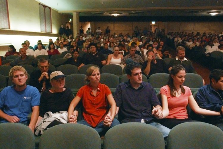 students hold hands