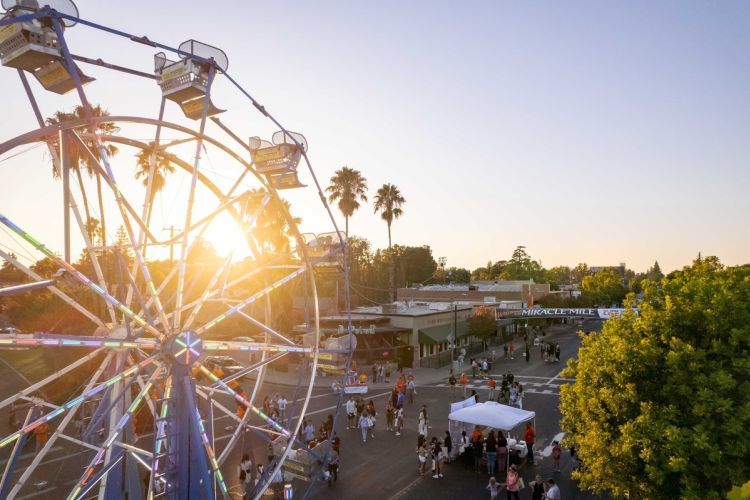 a ferris wheel was set up on miracle mile during week of welcome
